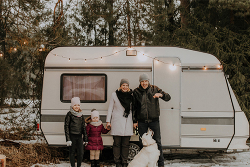 Happy family enjoying RV vacation